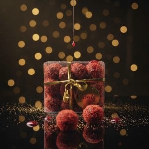 Bolas de Trufa con Nata y Mantequilla con Puré de Frambuesa